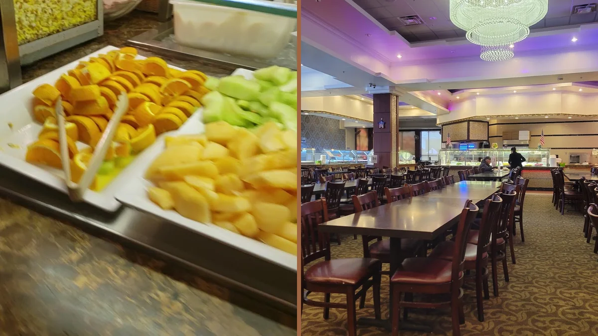 Dessert cakes and fruit on a buffet counter.